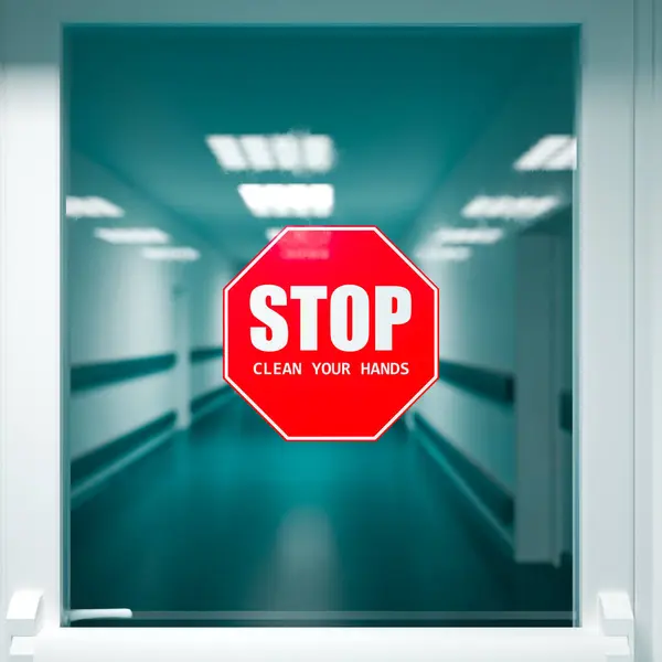 Hastane Koridorundaki Cam Pencereye Yapıştırılan Koyu Kırmızı Ellerinizi Temizleyin Tabelası - Stok İmaj