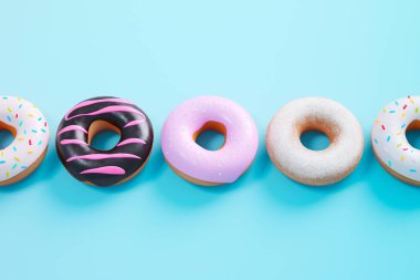 Canlı, mavi bir yüzey üzerinde çeşitli camlı ve dekore edilmiş donutların büyüleyici bir görüntüsü, baştan çıkarıcı çeşitlilikte tatlar ve renkler sunuyor..