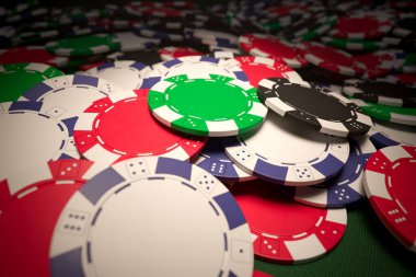 An eye-catching display of scattered, vibrant poker chips on a lush green felt surface, highlighting the unpredictable nature of gambling and casino games. clipart