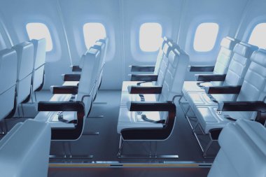 Boş, modern bir ticari uçak kabinine büyüleyici bir bakış, parlak oturma düzenleri ve pencerelerden sızan doğal ışıklandırma..