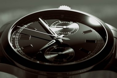 Bu yakın plan, lüks bir kol saatinin zarafetini yakalar. Karmaşık kadranını, yansıtıcı metalik yüzeyini ve tasarım detaylarındaki inceliği gösterir..