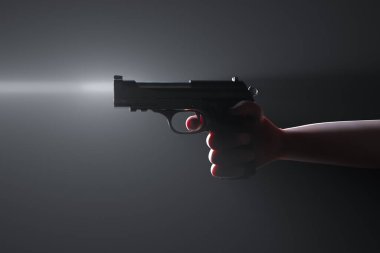 Bu resim, koyu, esrarengiz bir arkaplanda hafif ışıklandırmayla aydınlatılmış siyah bir tabancayı sıkıca tutan bir elin ayrıntılı bir yakın çekimini yakalar..