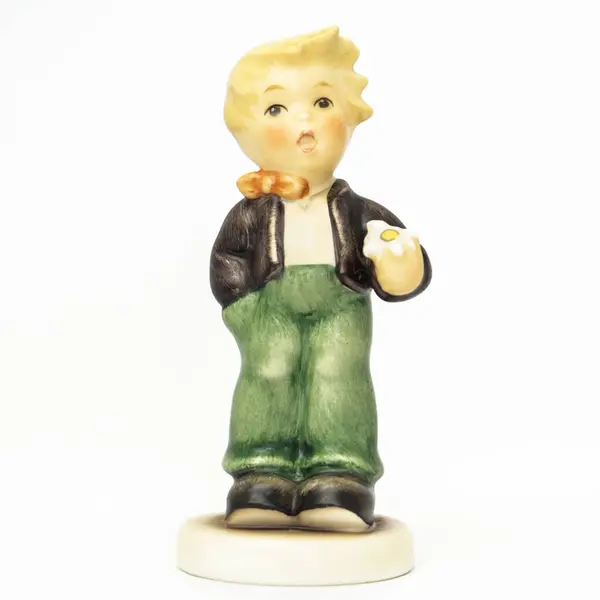 stock image Porcelain Figurine of a Boy with Daisy - German Manufactory Collectible 