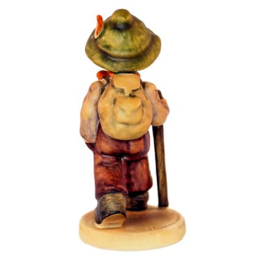 Elinde baston olan klasik bir çocuk porselen figürü. Hummel stili. Yüksek kalite fotoğraf