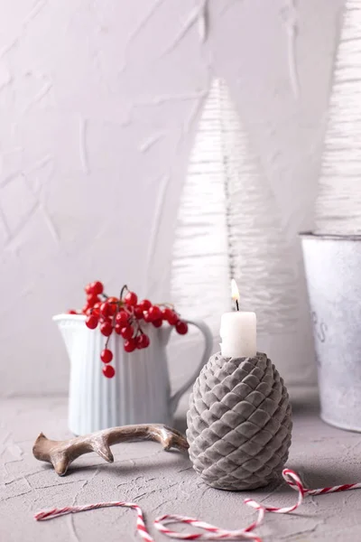Winter Decorations Grey Red Blue Burning Candle Jug Winter Berries — Stock Photo, Image