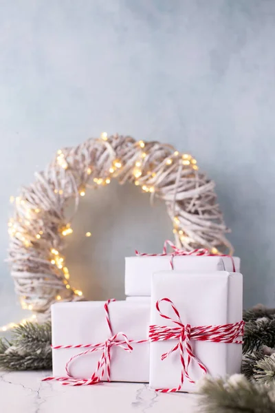 Composition Wrapped Boxes Presents Wreath Fairy Lights Branches Fir Tree — Stock Photo, Image