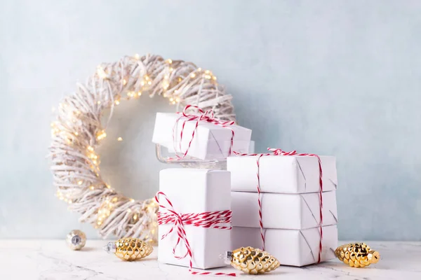 Wrapped Boxes Presents Decoraative Golden Cones Wreath Fairy Lights Decorative — Stock Photo, Image