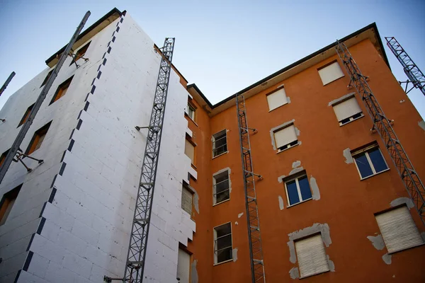 Construction of external building thermal insulation for energy efficiency. Italian Superbonus 110%. Ecobonus 110%.