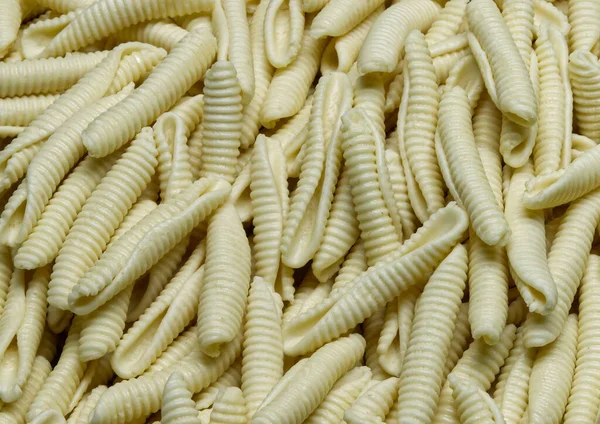 Uncooked Italian Maccheroni Pettine Pasta Background — Stock Photo, Image