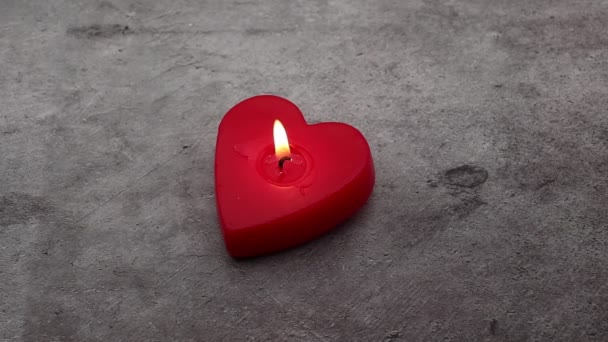 Red Heart Shaped Candle Candlelight Isolated Stone Background Romantic Valentine — Vídeos de Stock