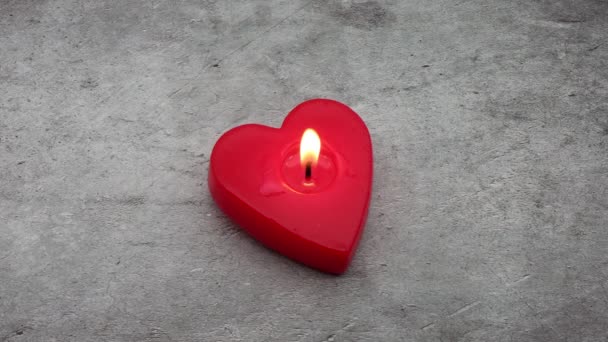 Red Heart Shaped Candle Candlelight Isolated Stone Background Romantic Valentine — Video