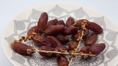 Organic Deglet Nour dates from Tunisia rotate in a circle. Video 4K