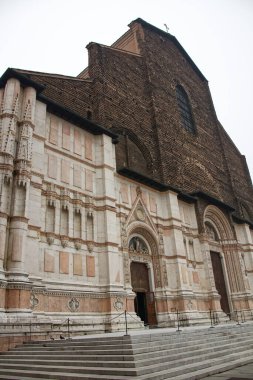 Bologna - Italy - December 24, 2022: Incomplete facade of Basilica of San Petronio in Bologna, Italy