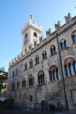 Trento - Italy: April 12, 2022: Palazzo Pretorio and Torre Civica. Praetorian Palace and the Civic Tower. clipart