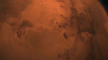 Uzaydaki Mars 'ın detaylı görüntüsü. Mars yüzeyinin yakın plan görüntüsü, paslı turuncu arazi ve kraterlerini yıldızlarla serpiştirilmiş karanlık bir gece gökyüzünün arka planına karşı sergiliyor..