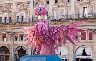 Bologna - Italy - December 31, 2024: Il Vecchione (The old man). Mercurio la fenice (Mercury the phoenix) by Yole Signorelli. This huge simulacrum, representing the past year, is burning at midnight of New Year's Eve in the main square of Bologna. clipart