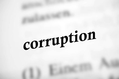 corruption - in black white text on paper clipart