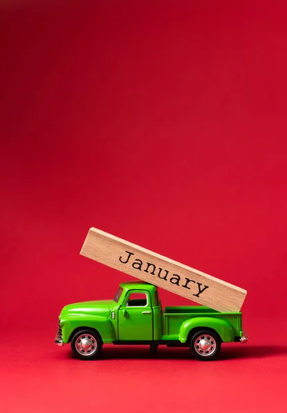 Zöld Retro Játék Autó Szállító Része Egy Naptár Január Hónapban Stock Kép