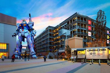Fukuoka, Japan - Nov 20 2022: Full-size Mobile suit RX-93ffv (Nu) Gundam at the Gundam Park in front of Mitsui Shopping Park Lalaport Fukuoka