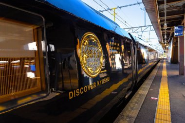 Fukuoka, Japan - Nov 28 2022: 36+3 luxury train inaugurated in October 2020. The train is designed to the highest standard of luxurious comfort and operated on 5 routes in Kyushu region