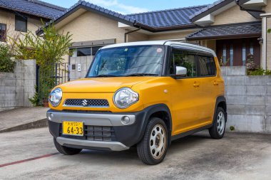 Nakatsu, Japonya - 26 Kasım 2022: Suzuki Hustler, Japon otomobil üreticisi Suzuki tarafından 2014 yılından beri üretilen bir arazi aracı.