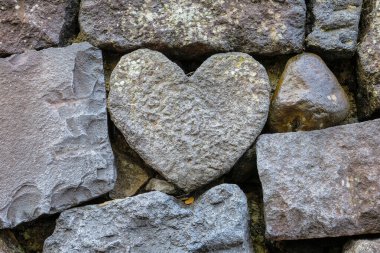 A Lovely Stone Heart Shape at Meganebashi Bridge in Nagasaki, Japan clipart