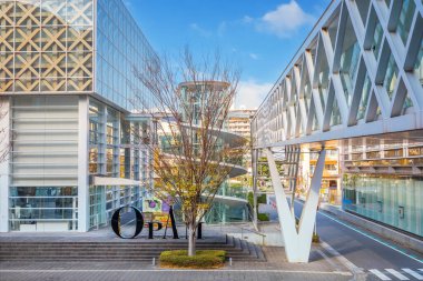 The Oita Prefectural Art Museum also known as OPAM, features modern exhibition spaces, artists studios, a caf and museum shop, designed by Shigeru Ban clipart