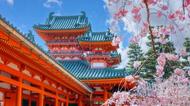 Heian Jingu Shrine during full bloom cherry blossom season in Kyoto, Japan clipart