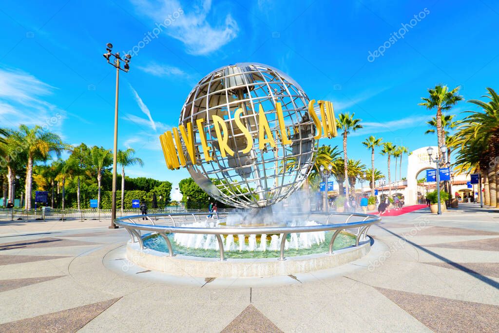 LOS ANGELES, CALIFORNIA - JANUARY 18, 2023: Iconic Universal Studios Hollywood Globe and Fountain at the Entrance to the Theme Park