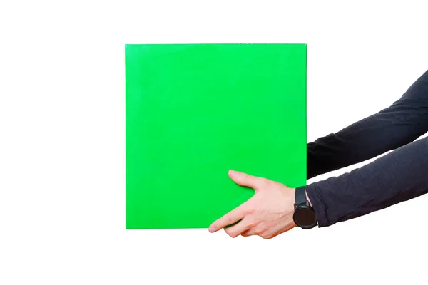信使手中的特写镜头小心地移交了一个白色背景的绿色大盒子 物流和电子商务相关概念 — 图库照片