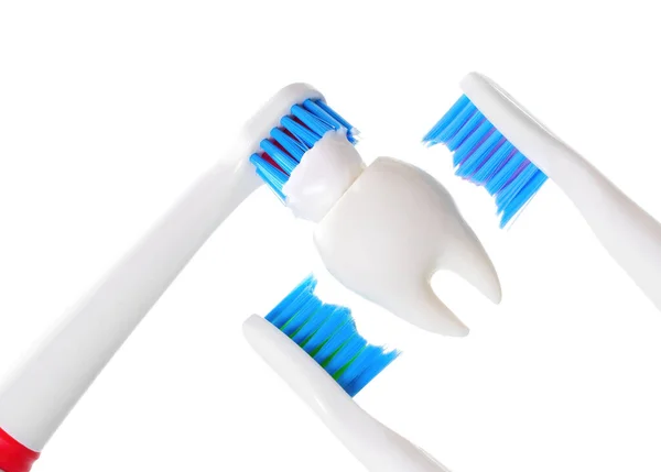 Three Electric Toothbrushes Cleaning Tooth Model Close View Regular Dental — Stock Photo, Image