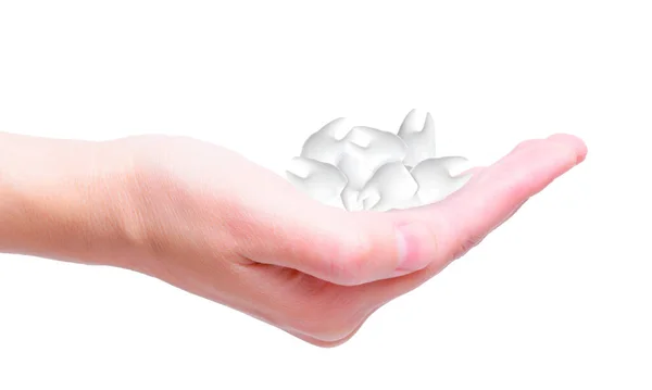 Mão Segurando Punhado Dentes Contra Fundo Branco Limpo Conceito Odontológico — Fotografia de Stock