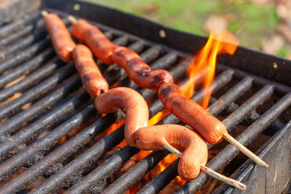 Delicious Sausages Sizzling Hot Fire Cooking Barbecues Grill Grate Perfect — Stock Photo, Image