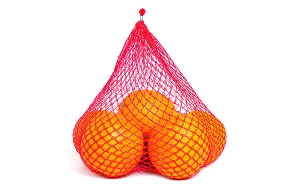 Bunch Van Verse Sappige Sinaasappelen Een Rode Mesh Zak Geïsoleerd — Stockfoto