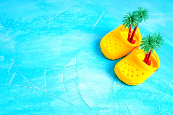 Tiny Lightweight Breathable Yellow Clog Shoes Toy Palm Trees Placed — Stock Photo, Image