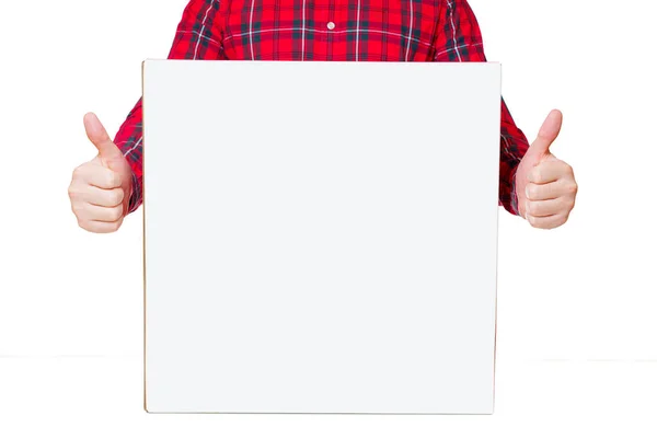圣诞礼物批准 一个大的白色盒子 放置在一个人的面前 身穿喜庆的红色和绿色格子衬衫 双手做着竖起大拇指的手势 — 图库照片