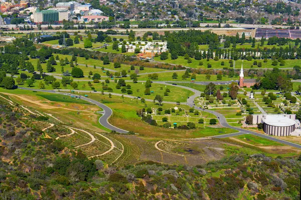 Serene view of the Forest Lawn Memorial Park from the heights of the Hollywood Hills.