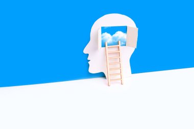 Beynin açık penceresine çıkan tahta basamaklı erkek başlıklı kağıt kesiği havada süzülen bulutları gösteriyor. Farkındalık meditasyonu ile ilgili arka plan sakinleştiriliyor.