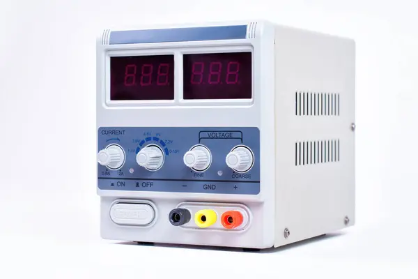 Close-up of a laboratory power supply unit having maximum output voltage of 15 volts.