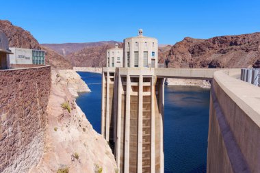 Massive Concrete Structures of the Hoover Dam, Including the Spillway House and Water Intake Towers. clipart