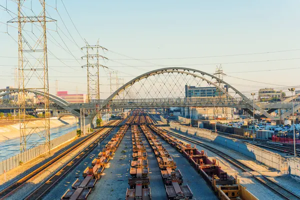 stock image Los Angeles, California - April 12, 2024: View of the train tracks and rail yard under the 6th Street Bridge