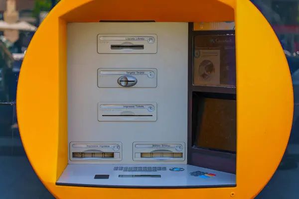 stock image Tarragona, Spain - July 15, 2024: Close-Up View of a CaixaBank's ATM in Tarragona, Spain