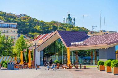 Kyiv, Ukraine - October 9, 2024: McDonald's at Poshtova Square with Hillside View clipart