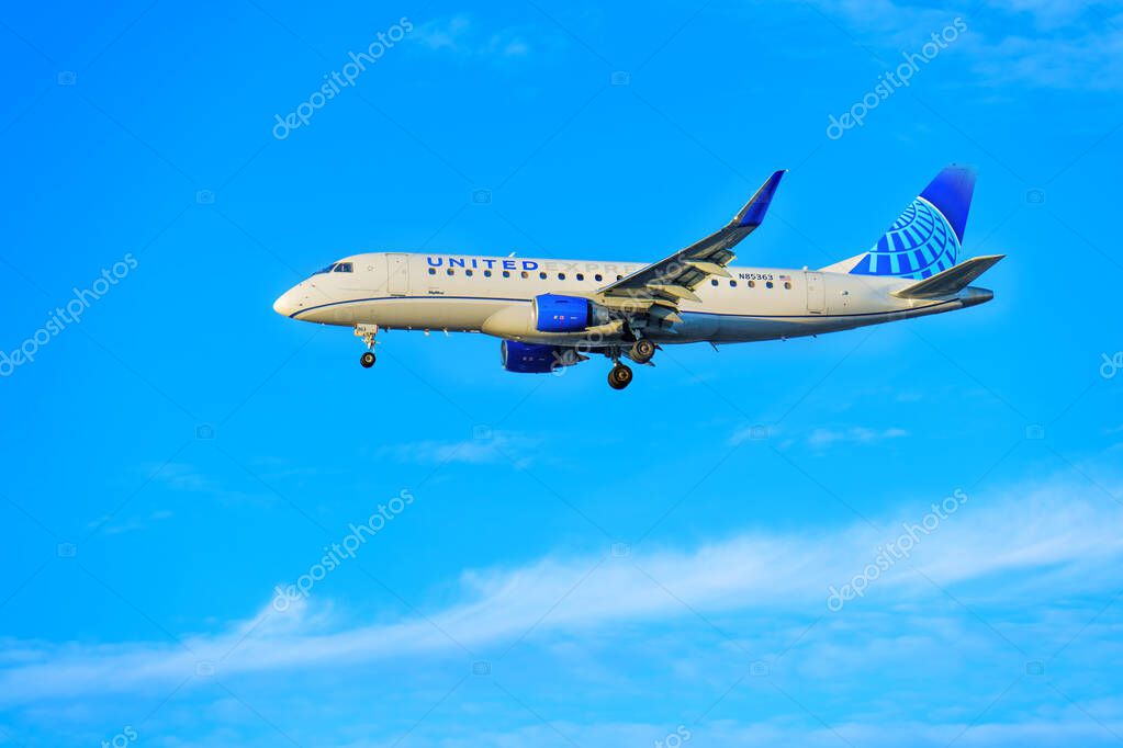 Los Angeles, California - January 6, 2025: United Airlines Aircraft Flying Over Los Angeles Sky