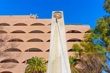 Riverside, California - December 31, 2024: Christiansen-Teel Clock Tower Monument at City Hall, Riverside clipart