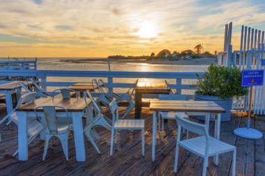 Malibu, California - November 29, 2024: Charming Sunset Dining Area at Malibu Farm Restaurant clipart