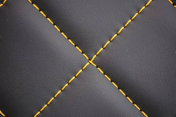 Yellow Contrast Thread Black Leather Car Seat Extreme Close — Fotografie, imagine de stoc