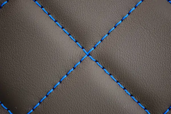Blue Contrast Thread Extreme Close Blurred Background Brown Leather Car — Stock Photo, Image