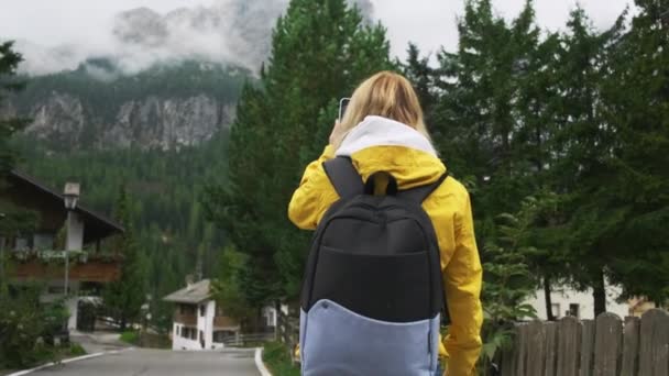 Woman Tourist Captures Moments Smartphone Town Mountains Blonde Lady Wearing — Stockvideo