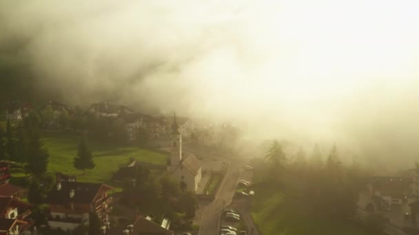 Dense Fog Covers Small Town Vintage Buildings Located Alps Sunrise — Stockvideo